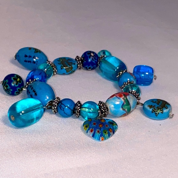 Beaded bracelet designed with turquoise stones and unique glass & worked clay. - Picture 4 of 12